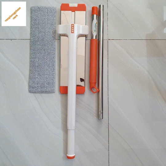 "Cây lau bẹ kéo tự vắt 42cm bản nhựa.    - 2 mop lau kèm theo - mop lau 42cm 2 đầu móc"